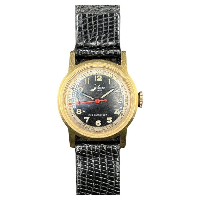Selza Automatic WWII Military Aviation Pilot Cold Capped 14K Gold Watch: This Selza Gold filled Automatic Cold Capped Watch from the WWII era was used extensively for US Air Force Pilots. The case is a 14K gold case with stainless steel parts and a luminous dial with blued