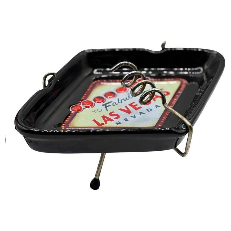 Retro Mid-century Style Black Ceramic Ashtray With Las Vegas Sign & Stand: This stylish mid-century-inspired black ceramic ashtray features the iconic "Welcome to Fabulous Las Vegas" sign in a diamond-shaped ashtray. The chrome stand offers a cigarette holder is ideal for bo