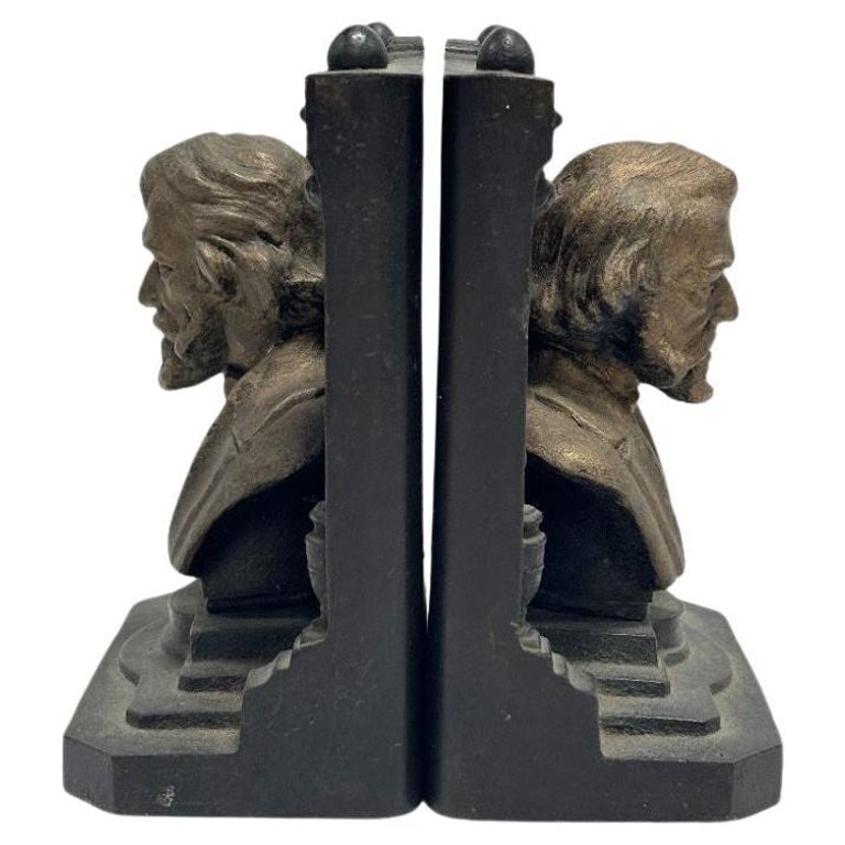 Solid Brass Bookends Bust Of Henry W. Longfellow by "B & H" Bradley and Hubbard: Henry Wadsworth Longfellow (1807–1882) was a renowned American poet, educator, and translator. His works, including "Paul Revere's Ride" and "The Song of Hiawatha," resonate with themes of patriotis