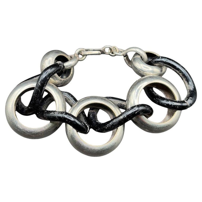 Avant Garde Sterling Silver Pomellato Link Chain Contored Gourmette Bracelet: Mid-century Sterling Silver Pomellato link chain, Contoured gourmette bracelet. Elegant and bold, this 1960s Avant Garde gourmette bracelet features contoured chain links crafted in solid sterling sil