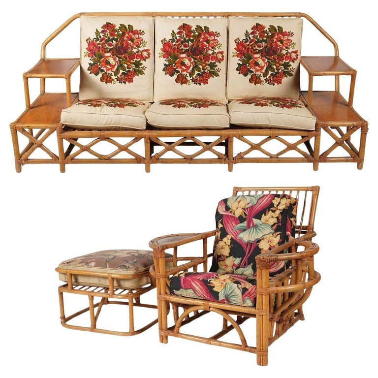 Rare MCM Stepped Rattan Sofa Chair Ottoman Livingroom Set w/ Built in End tables: This beautifully restored Paul Frankl-inspired stepped mid-century rattan living room set featuring a lounge chair and 3-seat sofa with built-in 2-tier end tables and matching ottoman. The set feature