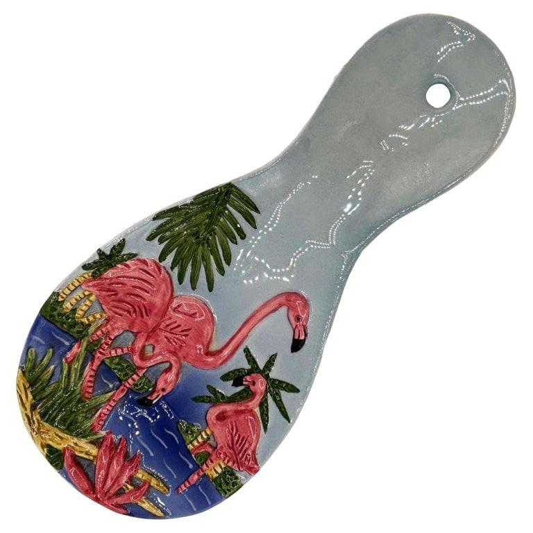 Mid-century Hand Painted 3d Flamingo on a Tropical Beach Themed Spoon Rest: Mid-century Era pink and green 3d Flamingo ceramic spoon rest with several flamingos enjoying a beach holiday. The Spoon Rest features a beautifully detailed pink flamingo flock with blue sky and sand
