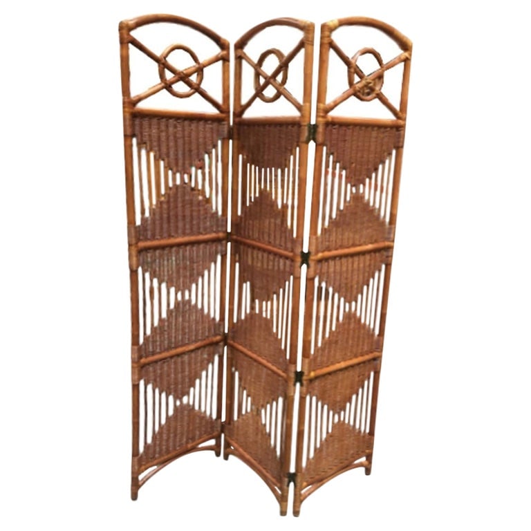 Folding Screen, Rattan and Woven Wicker 3 Panel: This beautifully restored Paul Frankl-inspired Folding Screen with Rattan and Woven Wicker panels is a charming 3-panel room divider featuring butterfly hinges for easy folding and storage. Crafted wi