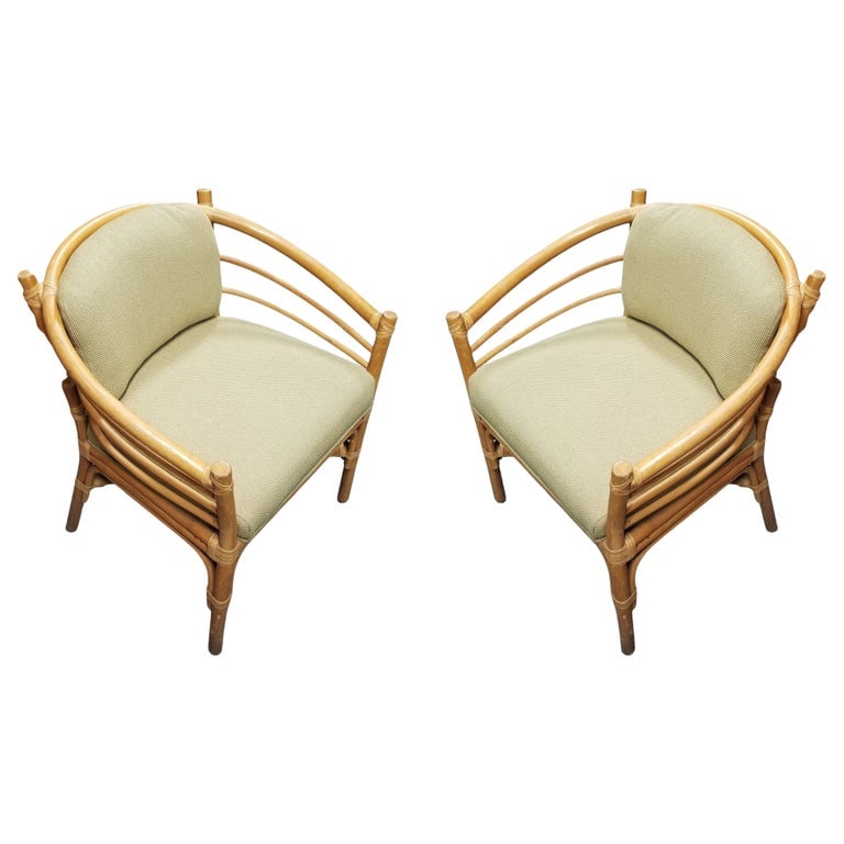 Restored Rattan Barrel Back Dining Chair Armchair W/ Skeleton Arms - Pair: Pair of restored Paul Frankl-inspired rattan barrel-backed dining armchairs with skeleton arms and leather wrappings.Circa 1950s.Restored to new for you.We only purchase and sell only the best and fin