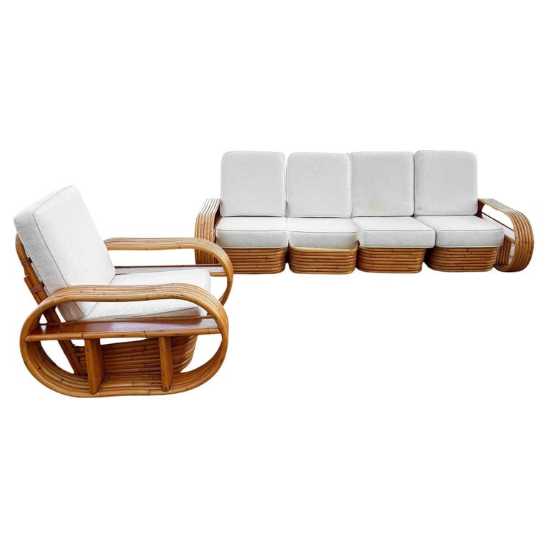 Restored Rattan Six-Strand Shelf Arms Sofa and Chair Set: This beautifully restored Paul Frankl style rattan blends style and vintage charm with modern comfort. This stunning set features a four-seat sofa and matching lounge chair, all expertly restored to t