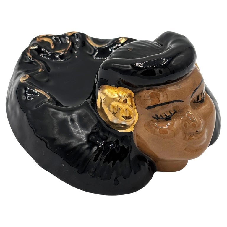 Mid-century Califoria Pottery Hula Girl Ashtray by Kaye of Hollywood: Rare California pottery ceramic Hula Girl Ashtray by Kaye of Hollywood/Katherine Schueftan. The ashtray features a female portrait with her hair forming the bowl of the ashtray. The sculpture features