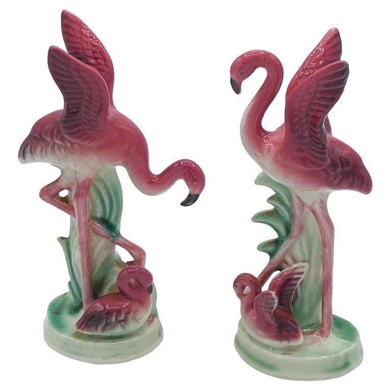 Mid-century Ceramic Miniature Pink Flamingo Tabletop Statue By Leftons: Mid-century pink and green miniature ceramic flamingo tabletop California pottery vase set of matching His and Her set by Leftons. The set features two beautifully detailed pink flamingos in lush gree