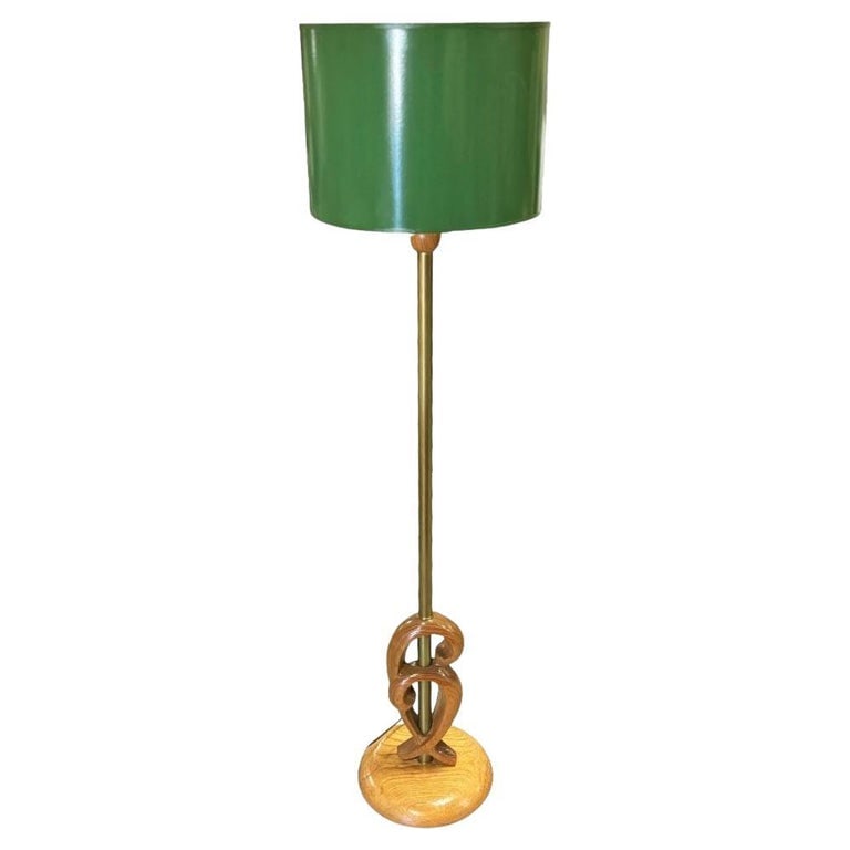 Mid Century Carved Oak Sculptural Floor Lamp by Yasha Heifetz: Yasha Heifetz, the designer behind Heifetz Manufacturing designed this floor lamp with a meticulously carved sculptural free-form base with a brass socket/lamp shade holder extending upward. It featur