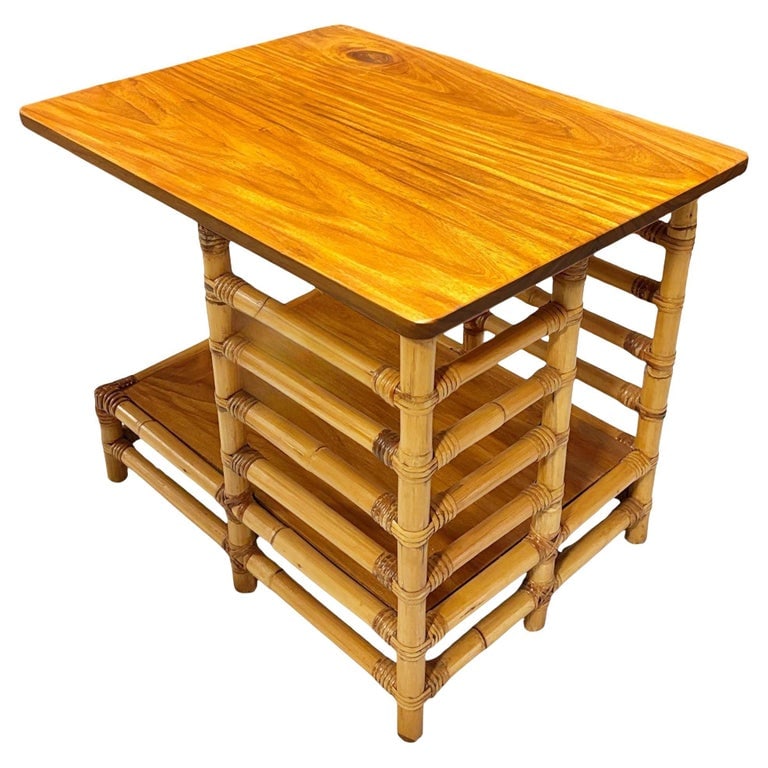 Restored "Jacob's Ladder" Asymmetric Rattan Side Table: This beautifully restored Paul Frankl style rattan blending style vintage charm with modern comfort. Floating asymmetric "Jacob's Ladder" side table featuring a unique open-ended design that gives the