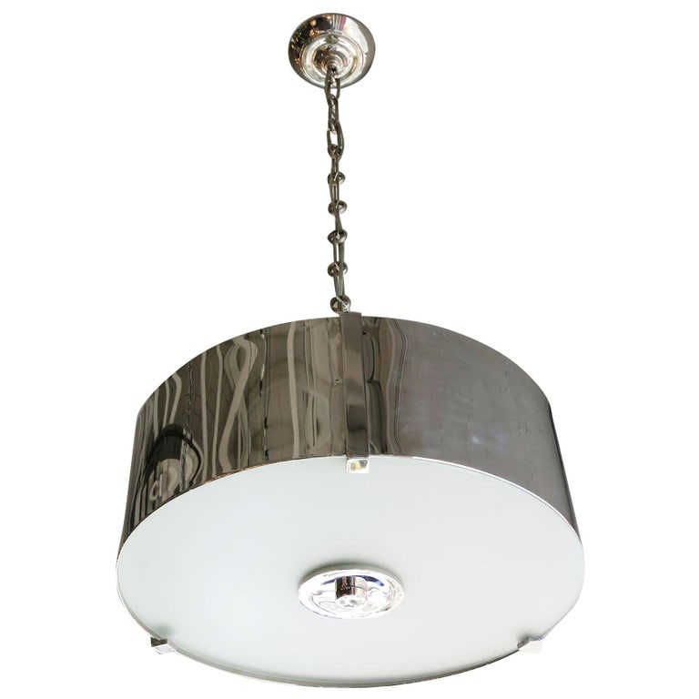 Chrome Drum Chandelier with Frosted Glass Shade: Large chromed steel drum chandelier with a frosted glass shade suspended by three cubist-style fasteners and a chrome center screw cap. The chandelier is suspended from a unique custom-made chrome cha