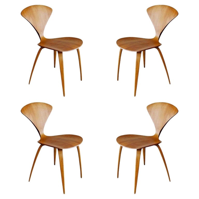 MCM Sculptural Bent Walnut Dining Chairs by Norman Cherner for Plycraft Set of 4: Set of 4 sculptural dining side chairs made from steam form bent walnut plywood, designed by Norman Cherner for Plycraft, American. The chair features graceful, sweeping arms, a tapering shell transit