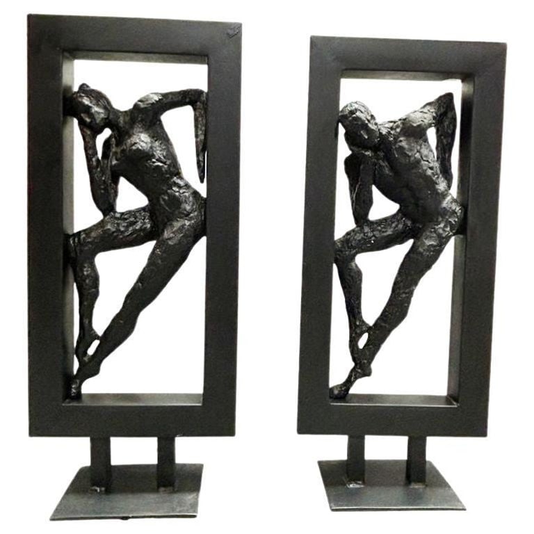 Abstract Ballet Dancers Sculptures by Gerard Koch for Austin Productions, Pair: This exquisite vintage abstract bronze sculpture, crafted by renowned French artist Gerard Koch (1926-2014) for Austin Productions, captures the grace and beauty of male and female ballet dancers in a