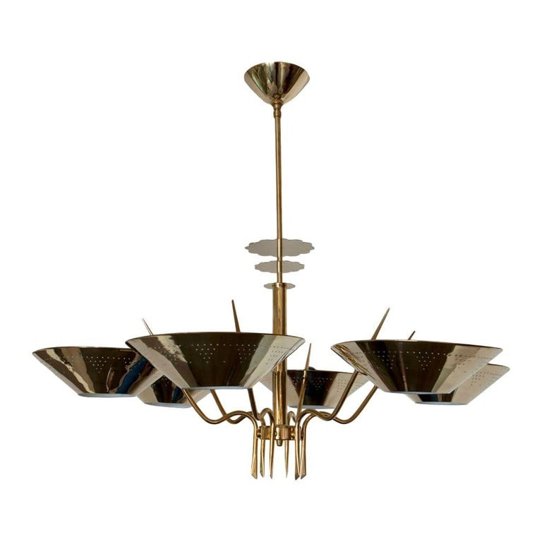 Six-Arm Austrian Chandelier, circa 1950 Pair: Large 38" Diameter solid brass Mid-century Austrian Sculptural chandelier with six arms. The Chandeliers features 8 petite arms branching from a large center post, connecting to 8 perforated triangle 