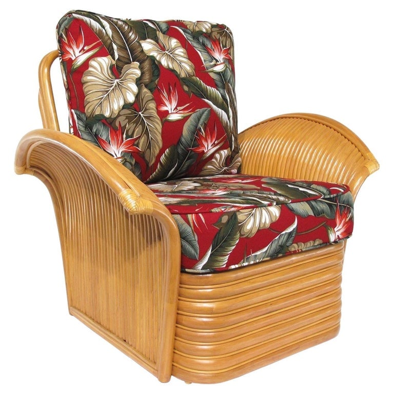 Art Deco Style "Golden Girls" Rattan Fan Arm Lounge Chair: New old stock rattan Art Deco-style lounge chair. The chair features beautifully shaped "Fan" arms with a stacked rattan base. Add that 1930s Hawaiian charm and timeless tropical vibe to your home wit