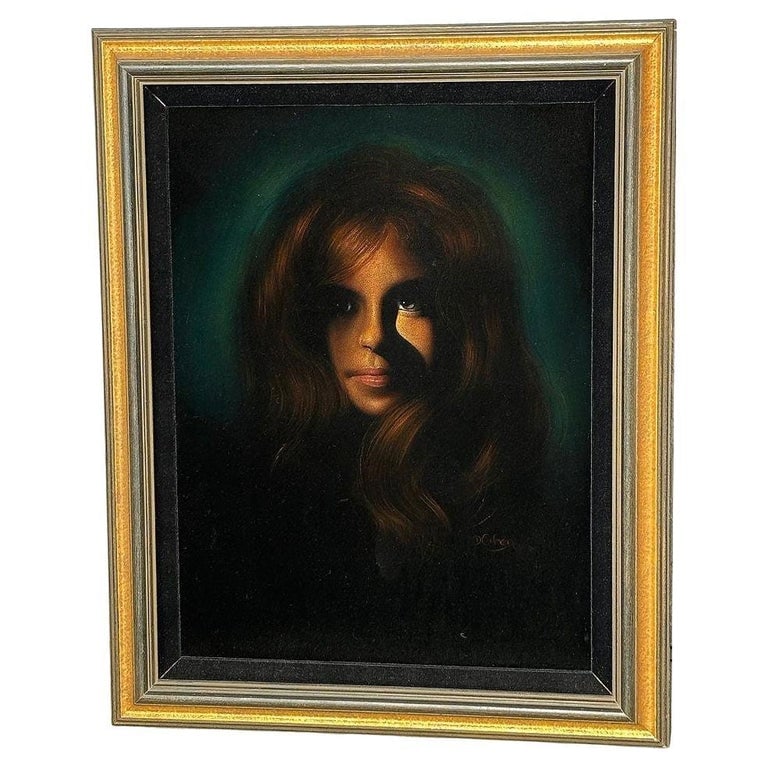 Framed Mid-century Hand Painted Oil on Velvet Female Portrait, Signed Cohen: This exquisite mid-century oil on velvet painting features a captivating portrait of a young green-eyed woman. The painting's black velvet creates depth and dimensional from the teal light backlightin
