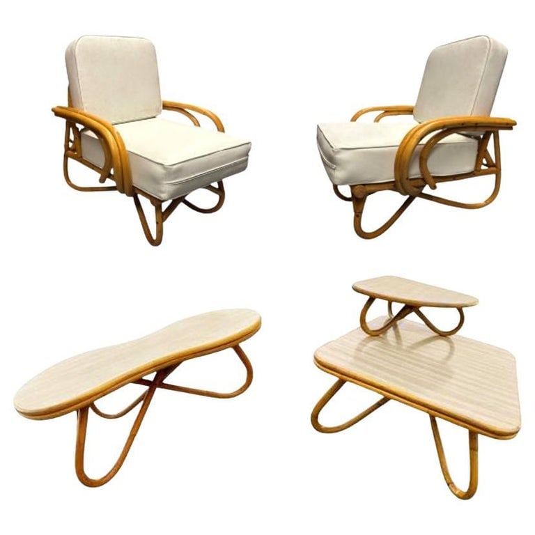 Restored Rattan Loop Leg Livingroom Set: This beautifully restored rattan blends style and vintage charm with modern comfort. Made in 1950, this Restored Rattan Loop Leg Living Room Set includes two elegant rattan and Formica tables and a pa