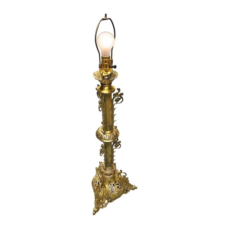 Hollywood Regency Neo-Gothic Scrolling Solid Brass Dragon Table Lamp: This original Hollywood Regency Neo-Gothic-inspired table lamp is made from solid brass and features dragon figures adorning each corner, while prominent Celtic crosses with traditional knot work patt