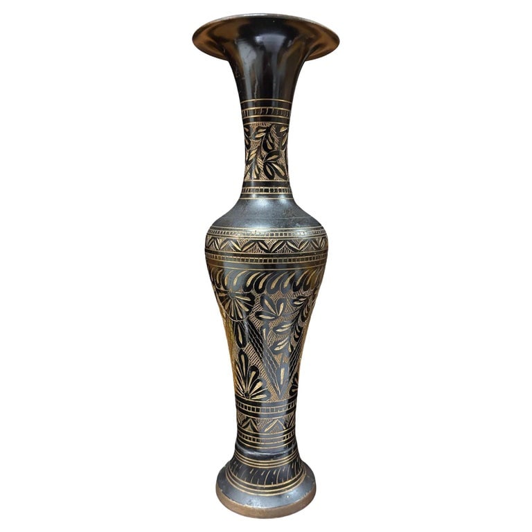 Indian Hand Etched Black Cloisonne Brass Floral Vase: This vintage Indian floral vase is a testament to the rich artistic heritage of India. Its dark, rich black finish provides a striking contrast to the warm brass detailing, adding depth and dimension 