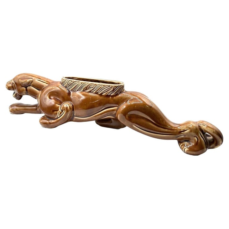 Mid-Century Stalking Panther Statue T.V. Lamp by Royal China & Novelty Co: Striking vintage ceramic TV lamp and planter in the form of a sleek resting panther, produced by Royal China & Novelty Co., Inc. during the height of the Mid-Century era, circa 1950s–1960s. This