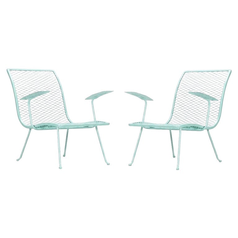 Pair of Teal Outdoor Patio Lounge Chairs by Karl Lightfoot Studio: Pair of Karl Lightfoot Studio outdoor lounge chairs crafted from tubular steel and expanded metal mesh, finished in a vibrant teal powder coat. Showcasing the clean lines and sculptural simplicity tha