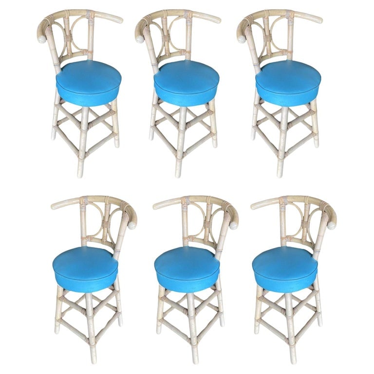 Restored Rattan Bar Stools with Hour Glass Seat Back, Set of 6: This beautifully restored Paul Frankl-inspired set of six, single-strand rattan bar stools with "Horsehoe" rattan back and blue vinyl seat.1960, United StatesSeat Height: 27"We only purchase and sell 