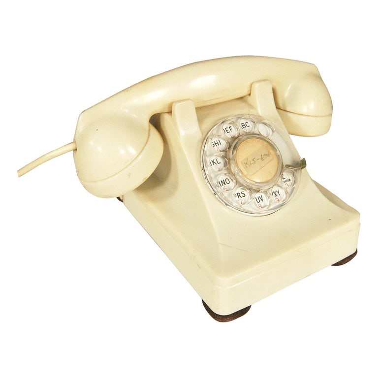 White 1930s Glamour Bakelite Telephone by Bell Systems: Vintage white bakelite 1930s glamor telephone made by Bell Systems for the Western Electric company.This phone is present in many Hollywood Glamor films of the 1930s.