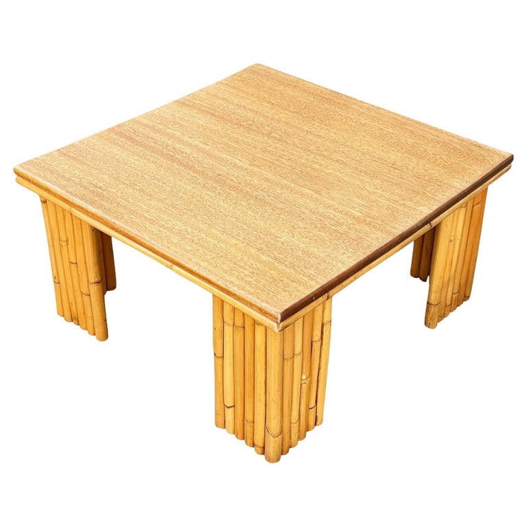 Restored Rattan & Koa Wood Square Coffee Table w/ Stacked Rattan Legs: This beautifully restored rattan & curly mahogany square coffee table with vertically stacked rattan legs. The table features a large mahogany top decorated with 2 strand rattan trim and rests on 
