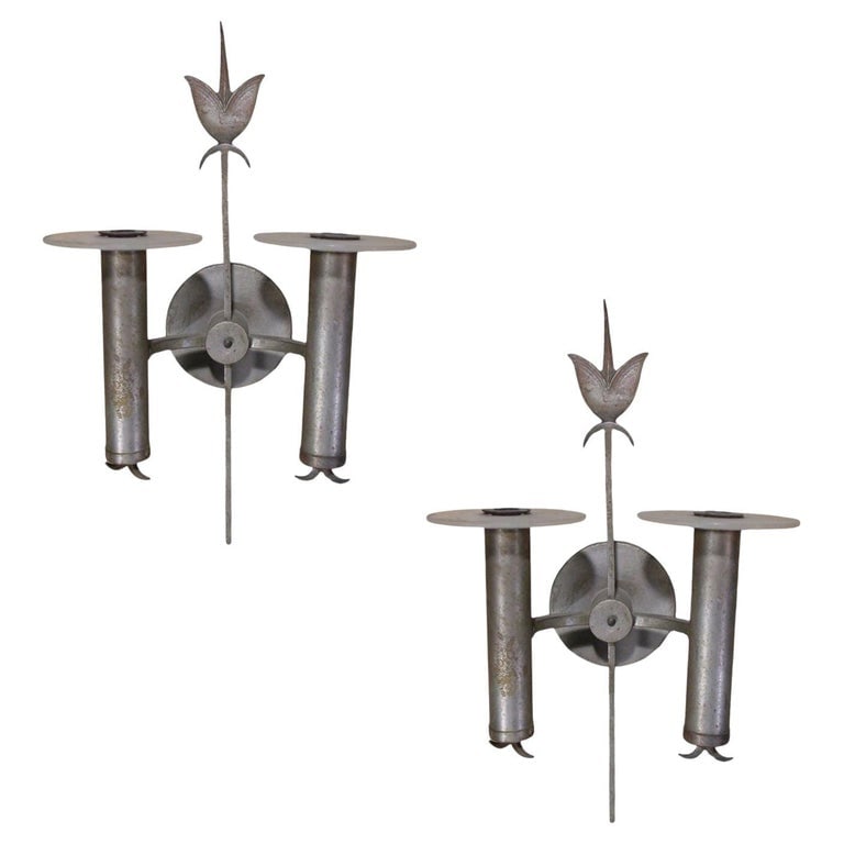 Pair of High Style Geometric Art Deco Silver Plate Bronze Wall Sconces: This pair of geometric Art Deco, silver-plated bronze wall sconces features an acrylic ring with two arms. Each arm includes details echoing the sconce's decorative center arrow.Dimensions: 16" height