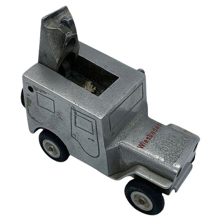 Rare Hand Machined Willys Jeep Ges-Gesch Table Lighter, West Germany by by Baier: Original polished aluminum and rubber late 1940s "Baier Willys Jeep & Trailer Table Lighter & Ashtray made by the Walter Baier Company, in U.S. occupied Germany shortly after WWII, Circa 1946.The body