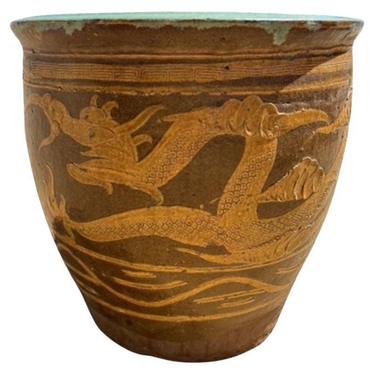 Antique Century Chinese Egg Art Pottery Holder Bird & Dragon Jardinière Planter: Late 19th-century Chinese art pottery egg jar featuring elegant bird, a dragon and plant motifs hand-applied around the body. Over 120 years old, these vessels were originally used to store black “C