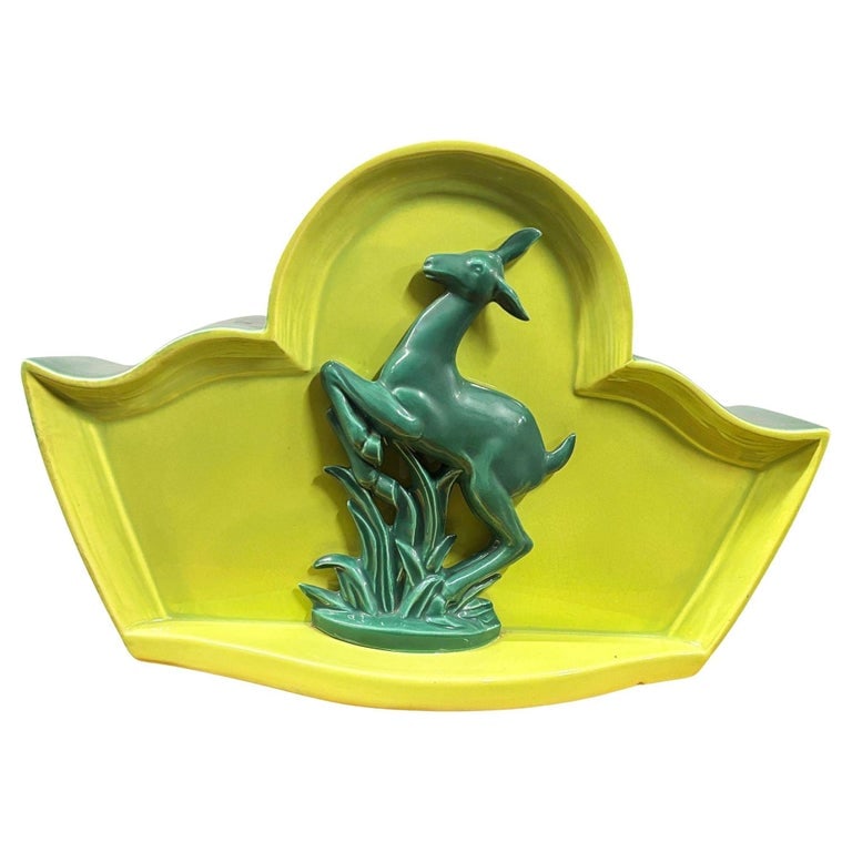 Mid-century Green Ceramic Jumping Deer Mantle TV Lamp by Shawnee Art Pottery: Original Mid-Century Modern green ceramic deer TV lamp with designed with a leaping gazelle or deer figurine against a contrasting base by Shawnee Art Pottery. Great for desks and mantles it takes a o