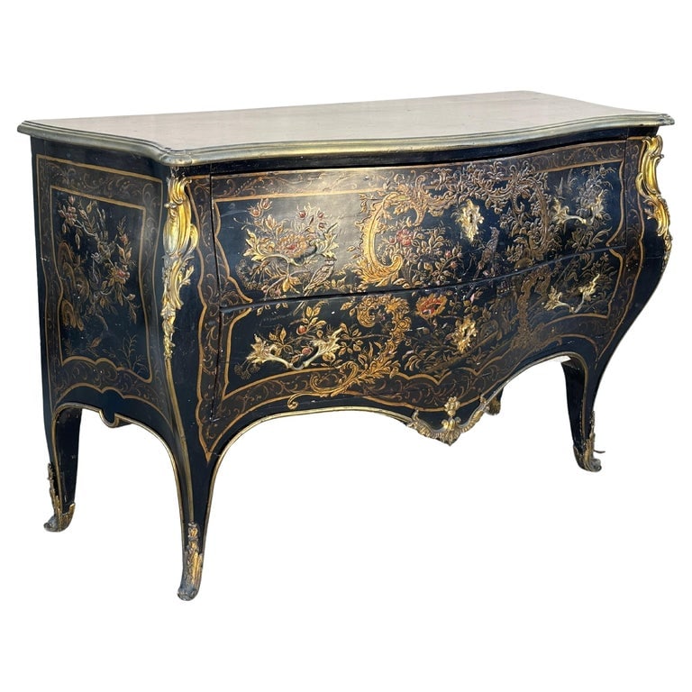 19th Century French with Brass Encroûtement Bombe Shaped Chinoiserie Commode: This 19th-century French bombe-shaped Chinoiserie commode is a statement of opulence and masterful craftsmanship. The piece boasts a rich, regal presence, accentuated by its flowing curves and exquisi