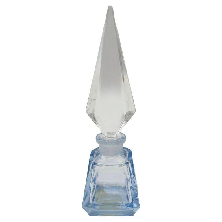 Art Deco Geometric Blue Crystal Perfume Bottle by Irice West Germany: This elegant ultra modern mid-century crystal perfume bottle by Irice in West Germany showcases the striking geometric design with the popular European glass-work style of the middle 20th century . Cr