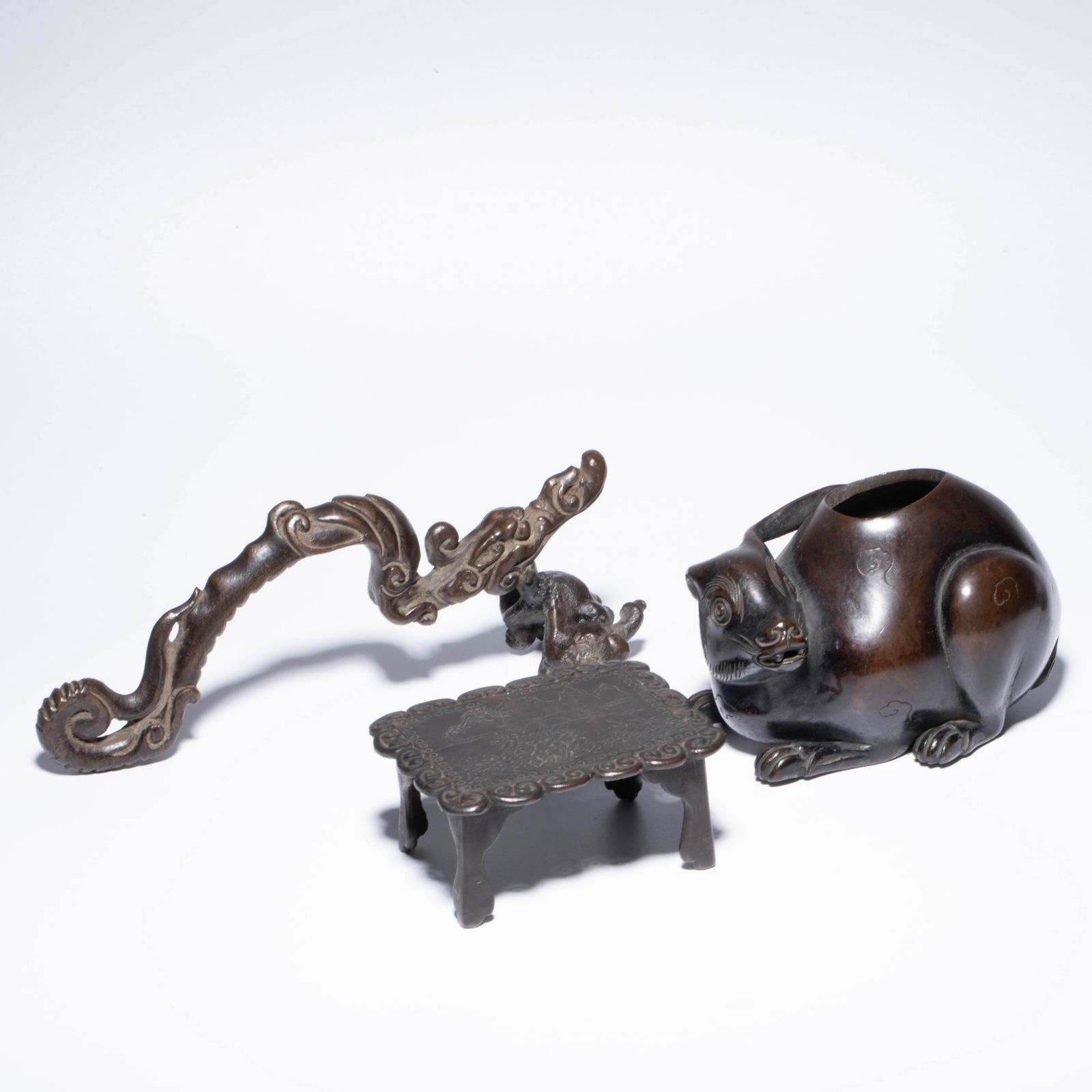 Three archaic bronze scholar’s objects: Three archaic bronze scholar’s objects