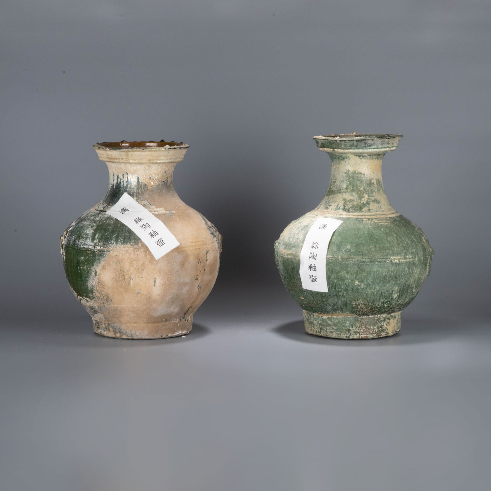 A pair of Han Dynasty green-glazed jars: A pair of Han Dynasty green-glazed jars