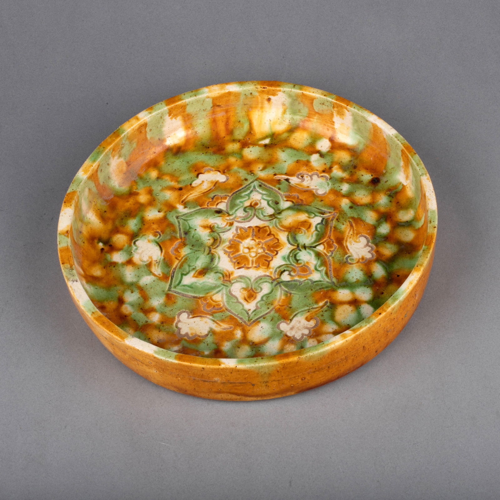 Tang Dynasty sancai incised-decorated plate (1 of 4)