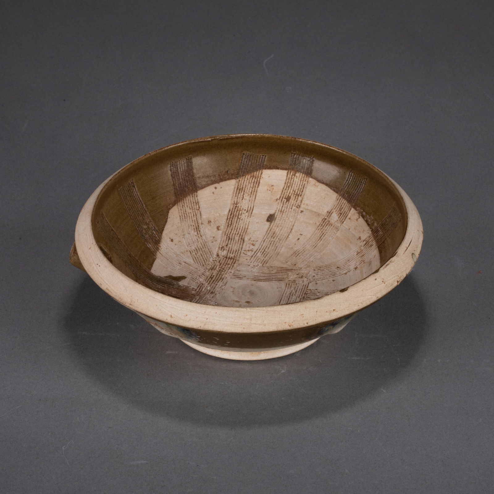 Tang Dynasty tea grinder with kiln-variation glaze (1 of 7)