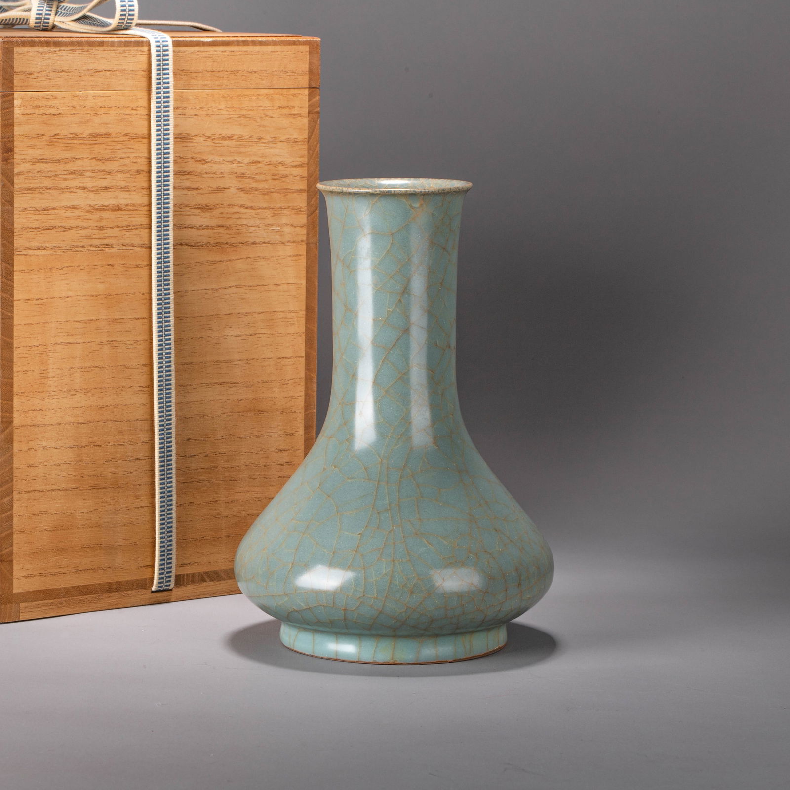 Longquan celadon gall bladder vase: Longquan celadon gall bladder vaseThis Song Dynasty Longquan "gallbladder" vase features a classic form—a straight neck, full shoulders, and a plump, rounded belly resembling a suspended