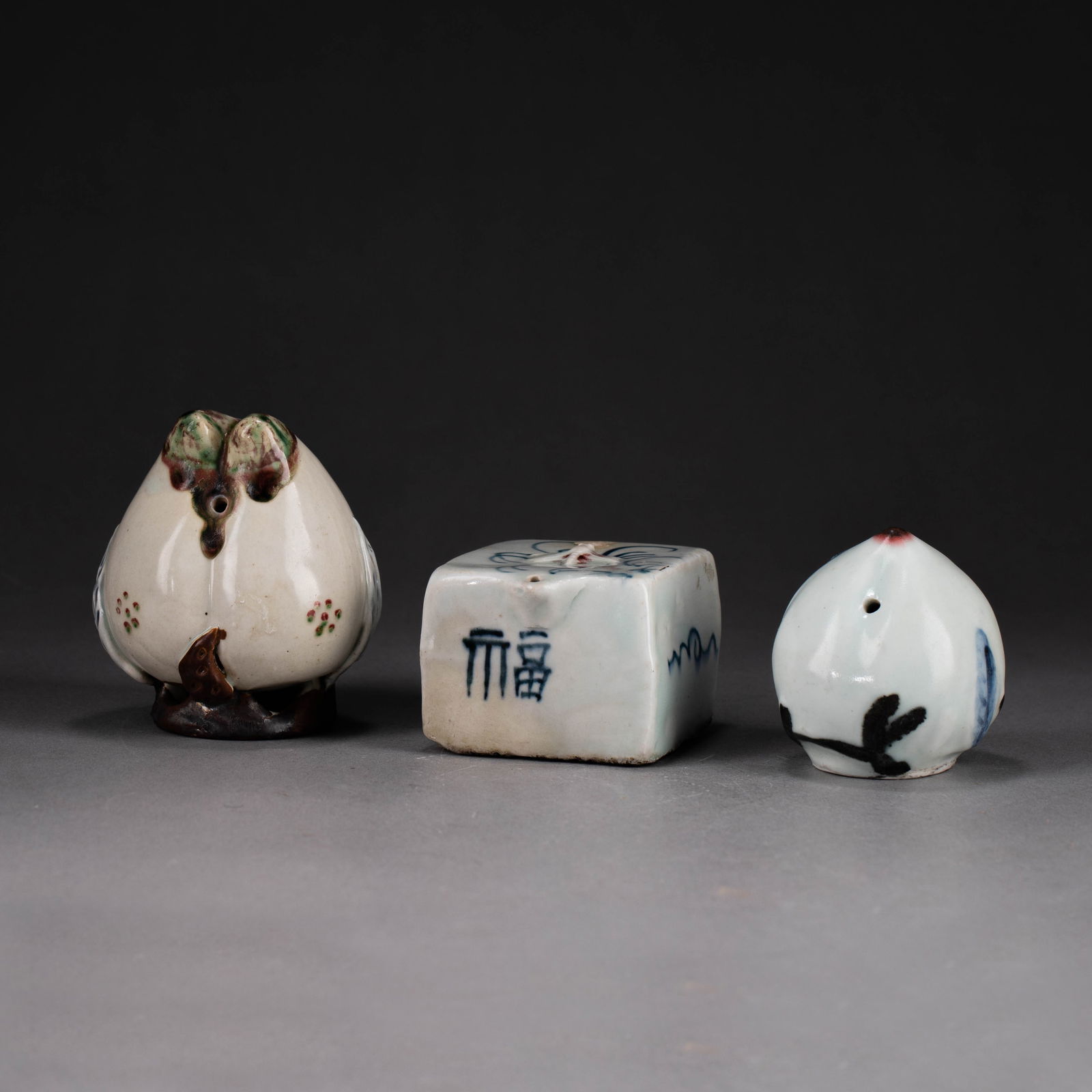 Three Joseon Dynasty underglaze-red water droppers: Three Joseon Dynasty underglaze-red water droppers