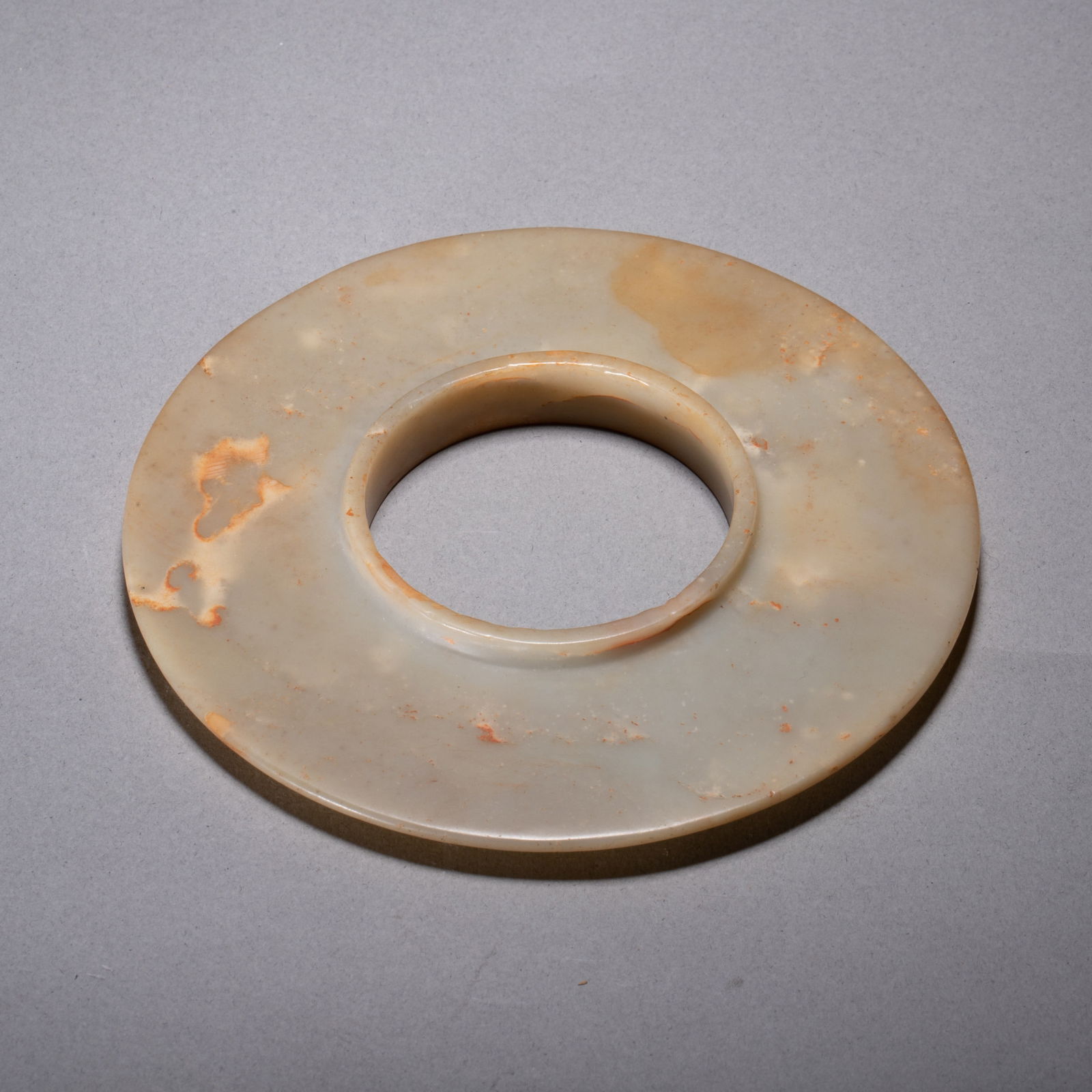 Shang Dynasty jade bi disc with raised lip (1 of 6)