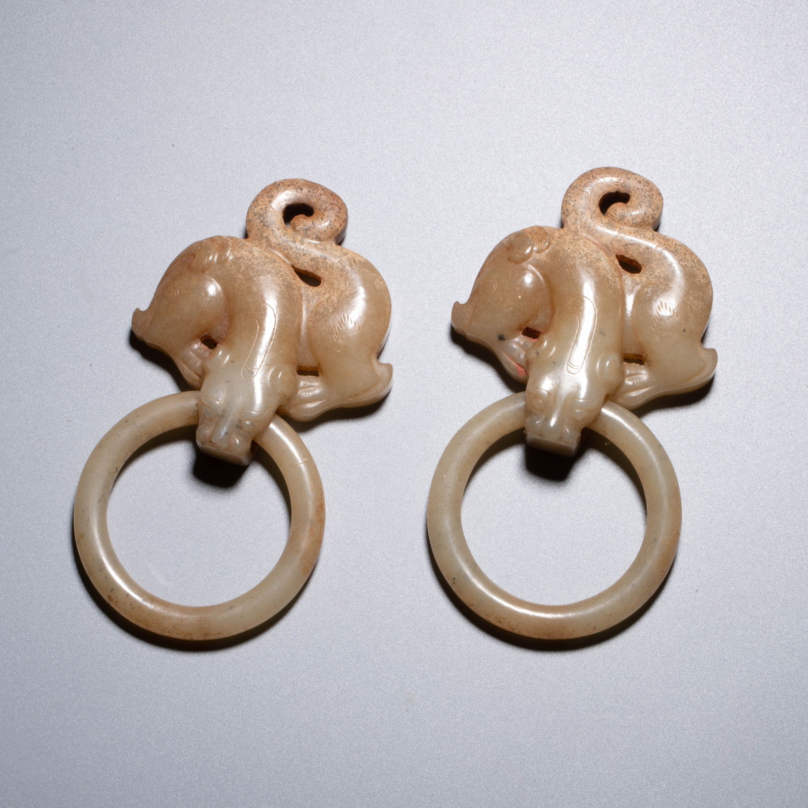 A pair of Ming Dynasty jade door knockers (pushou): A pair of Ming Dynasty jade door knockers (pushou)