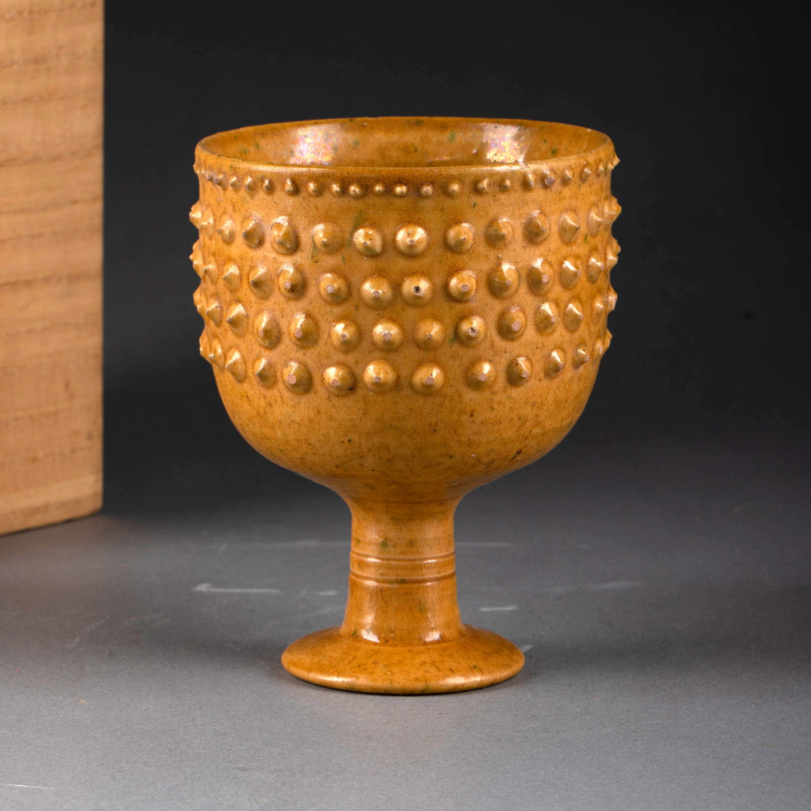 Northern Qi Yellow Glaze Nipple Pattern Stem Cup (1 of 7)