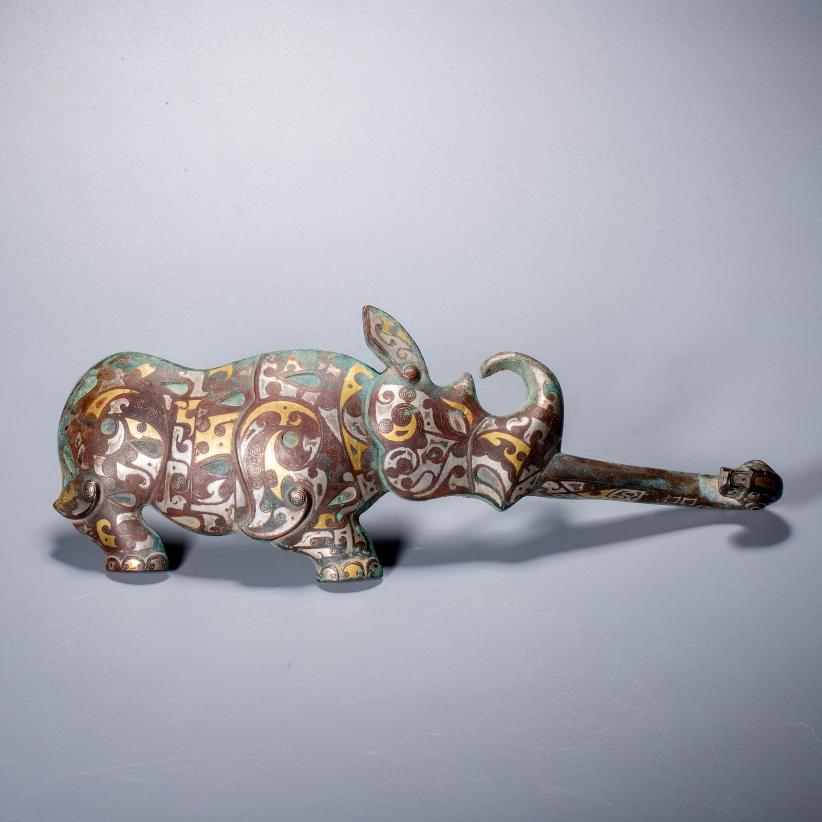 Warring States Period Gold and Silver Inlaid Rhinoceros-Form Belt Hook (1 of 7)