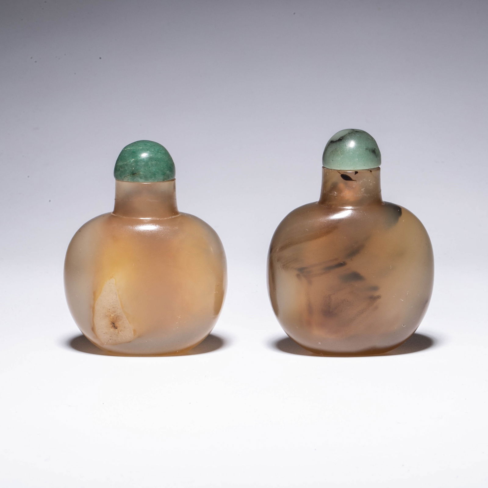 A pair of ancient jade snuff bottles from the Qing Dynasty (1 of 7)