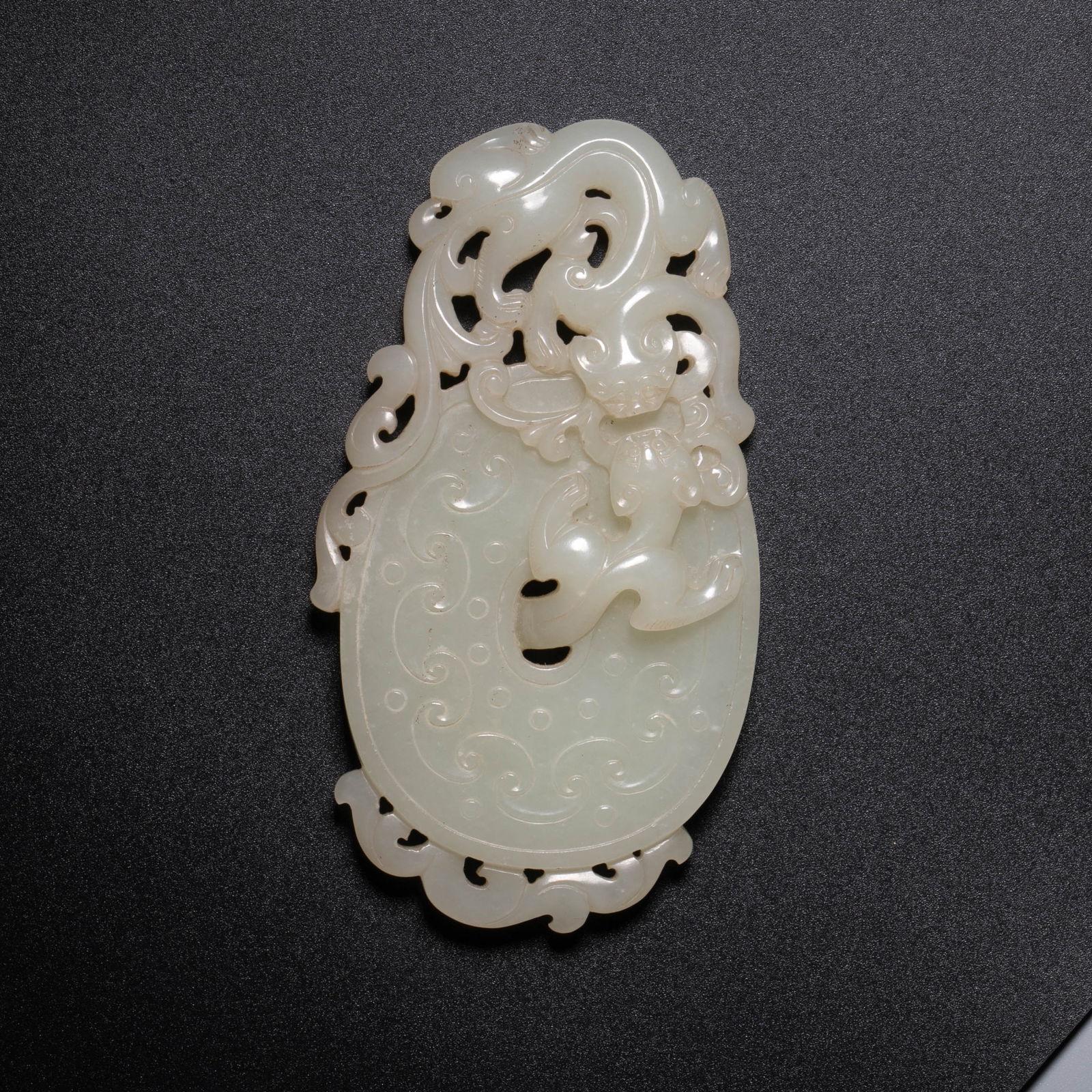 White jade with high relief chilong pattern: White jade with high relief chilong pattern
