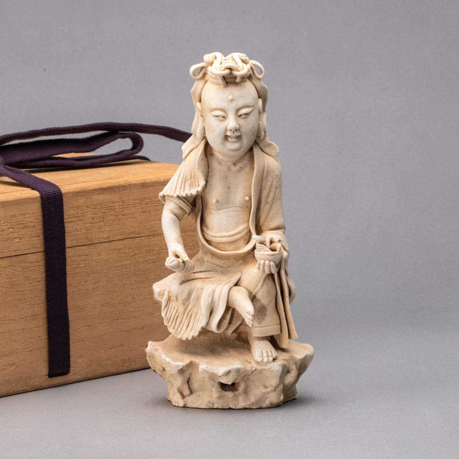 Song Dynasty qingbai ware Holding Lotus and Longevity Buddha: Song Dynasty qingbai ware Holding Lotus and Longevity Buddha