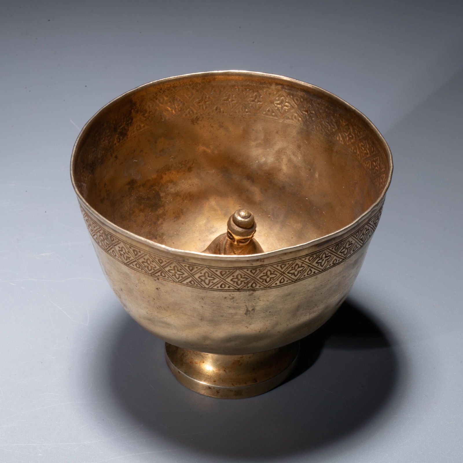 A gilt-bronze figural trick cup(also known in Europe as a Pythagorean cup), Song dynasty (1 of 9)