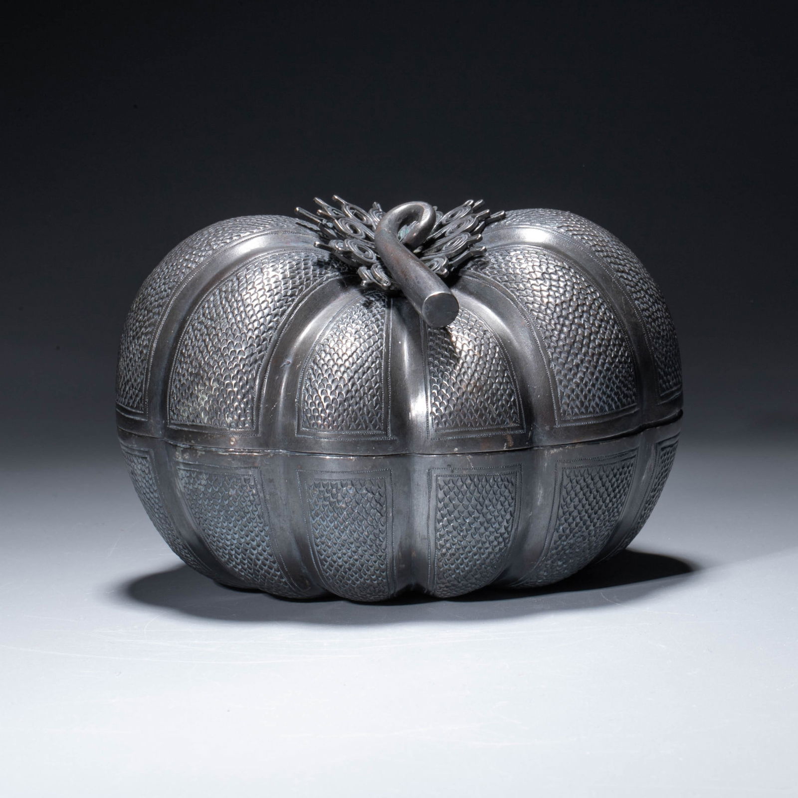 A silver pumpkin-form covered box, Qing dynasty: A silver pumpkin-form covered box, Qing dynasty