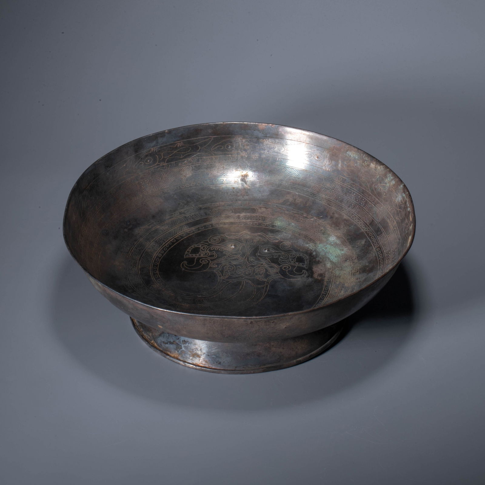 A silver dish decorated with taotie masks, Tang dynasty (1 of 6)
