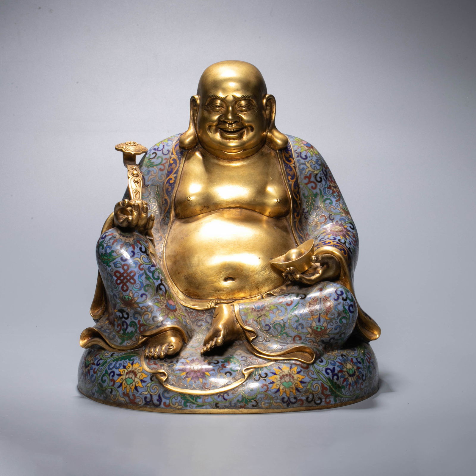 Gilt Cloisonné Enamel Figure of the Treasure-Holding Maitreya, Qing Dynasty: This Figure is a palace-style Figure of the Qing Dynasty. maitreya is in a sitting position, with his chest and abdomen exposed, a cheerful smile on his face, and a festive and peaceful expression. th
